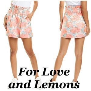 Revolve For Love & Lemons Jackpot Mini Skirt. Metallic jacquard rhinestone belt